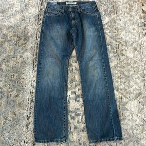 Mens Levi’s 514 slim straight blue jeans.